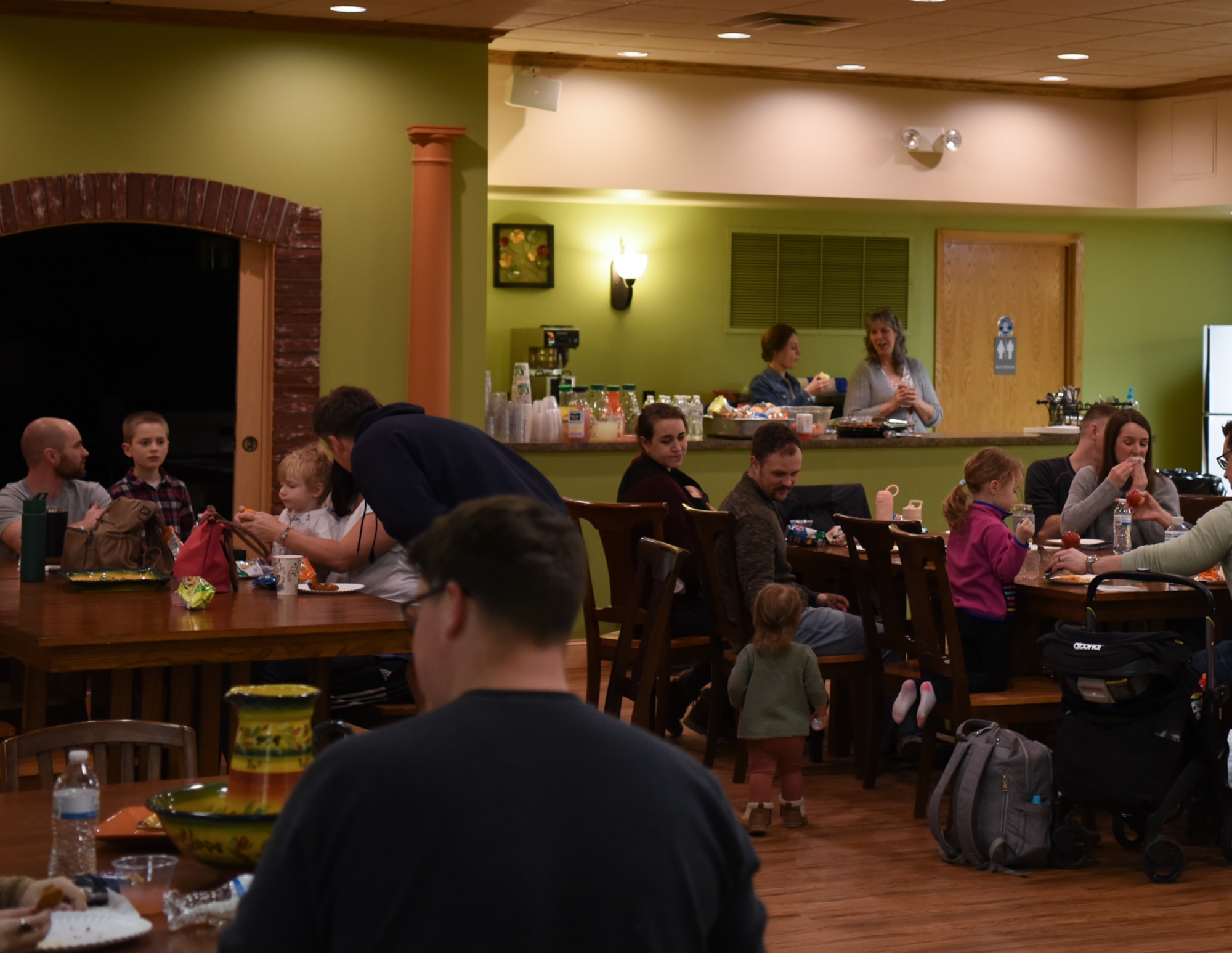 Families dine and participate in fellowship