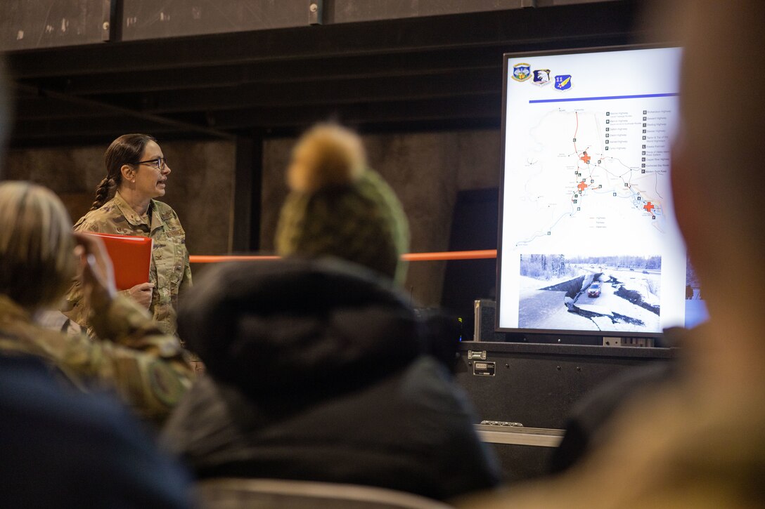 U.S. Air Force Col. Laura Baugh, 673d Medical Group Commander, gives a Cold Weather Medical Operations presentation to a joint-service delegation during Distinguished Visitor’s (DV) Day as part of exercise Arctic Edge 2024 (AE24) at Joint Base Elmendorf-Richardson, Alaska, March 4, 2024. The delegation visited and toured Camp Mad Bull, a site conducting several medical experiments in an arctic environment utilizing freeze dried plasma, portable oxygen generators, hypothermia prevention devices, core temperature monitors and more. AE24 DV Day fostered dynamic discussions among military, government, and academic leaders on arctic homeland defense, later featuring site visits, demonstrations, and presentations. Arctic Edge 2024 is a U.S. Northern Command-led homeland defense exercise demonstrating the U.S. military’s capabilities in extreme cold weather, joint force readiness, and U.S. military commitment to mutual strategic security interests in the arctic region. (U.S. Marine Corps photo by Lance Cpl. Madisyn Paschal)