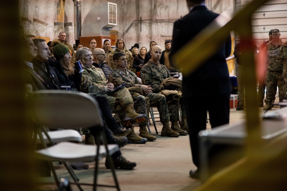 U.S. Marine Corps Maj. Gen. John Kelliher, Commanding General, 4th Marine Aircraft Wing, U.S. Marine Corps Forces Reserve, listens to a Cold Weather Medical Operations presentation alongside a joint-service delegation during Distinguished Visitor’s (DV) Day as part of exercise Arctic Edge 2024 (AE24) at Joint Base Elmendorf-Richardson, Alaska, March 4, 2024. The delegation visited and toured Camp Mad Bull, a site conducting several medical experiments in an arctic environment utilizing freeze dried plasma, portable oxygen generators, hypothermia prevention devices, core temperature monitors and more. AE24 DV Day fostered dynamic discussions among military, government, and academic leaders on arctic homeland defense, later featuring site visits, demonstrations, and presentations. Arctic Edge 2024 is a U.S. Northern Command-led homeland defense exercise demonstrating the U.S. military’s capabilities in extreme cold weather, joint force readiness, and U.S. military commitment to mutual strategic security interests in the arctic region. (U.S. Marine Corps photo by Lance Cpl. Madisyn Paschal)