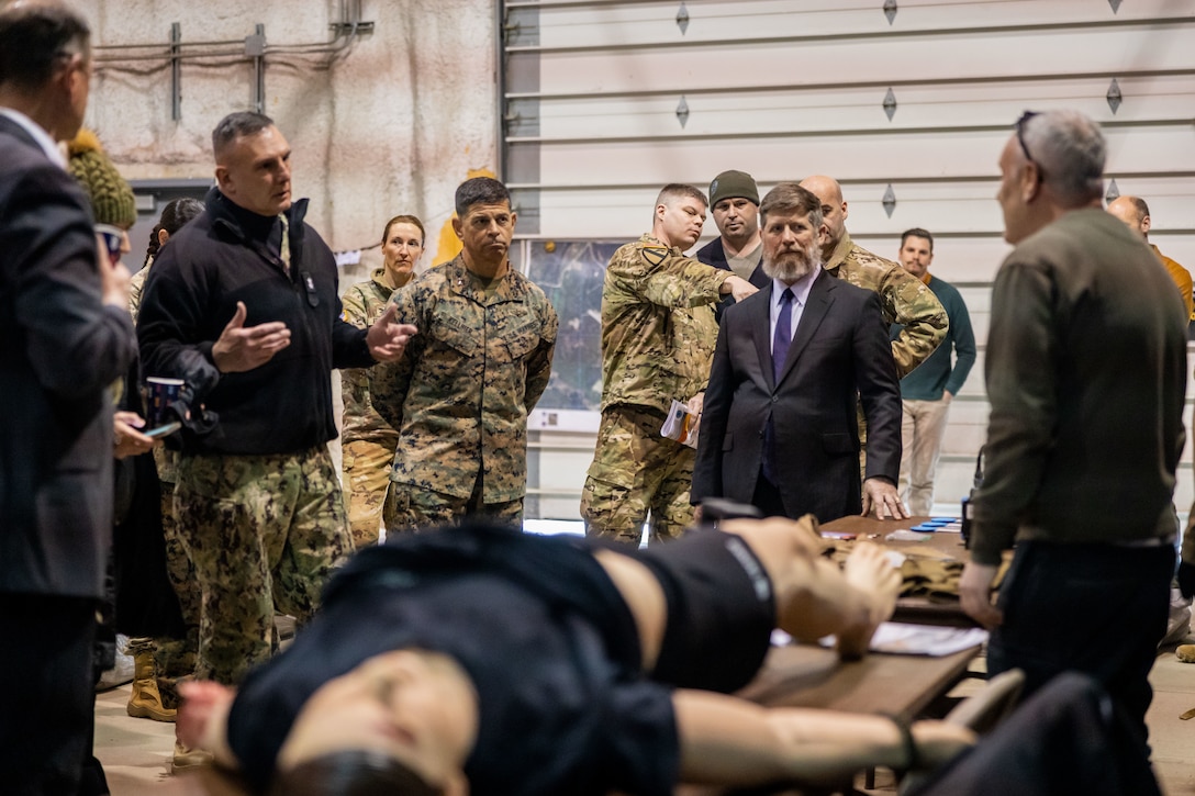 Mr. Yoel Fink, Professor of Materials Science and Engineering, Massachusetts Institute of Technology, demonstrates Fabric-Embedded Temperature Sensors to a joint-service delegation during Distinguished Visitor’s (DV) Day as part of exercise Arctic Edge 2024 (AE24) at Joint Base Elmendorf-Richardson, Alaska, March 4, 2024. The delegation visited and toured Camp Mad Bull, a site conducting several medical experiments in an arctic environment utilizing freeze dried plasma, portable oxygen generators, hypothermia prevention devices, core temperature monitors and more. AE24 DV Day fostered dynamic discussions among military, government, and academic leaders on arctic homeland defense, later featuring site visits, demonstrations, and presentations. Arctic Edge 2024 is a U.S. Northern Command-led homeland defense exercise demonstrating the U.S. military’s capabilities in extreme cold weather, joint force readiness, and U.S. military commitment to mutual strategic security interests in the arctic region. (U.S. Marine Corps photo by Lance Cpl. Madisyn Paschal)