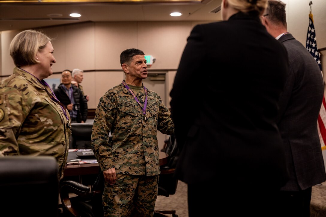 U.S. Marine Corps Maj. Gen. John Kelliher, Commanding General, 4th Marine Aircraft Wing, Marine Forces Reserve, converses with a joint-service delegation before partaking in a brief during Distinguished Visitor’s (DV) Day as part of exercise Arctic Edge 2024 (AE24) at Joint Base Elmendorf-Richardson, Alaska, March 4, 2024. AE24 DV Day served as a dynamic forum and facilitated discussions among military leaders, government officials, and academic experts on key issues related to the future of homeland defense in the arctic. The event featured site visits, demonstrations, and presentations, emphasizing the integration of diverse perspectives to strengthen regional partnerships. Arctic Edge 2024 is a U.S. Northern Command-led homeland defense exercise demonstrating the U.S. military’s capabilities in extreme cold weather, joint force readiness, and U.S. military commitment to mutual strategic security interests in the arctic region. (U.S. Marine Corps photo by Lance Cpl. Madisyn Paschal)