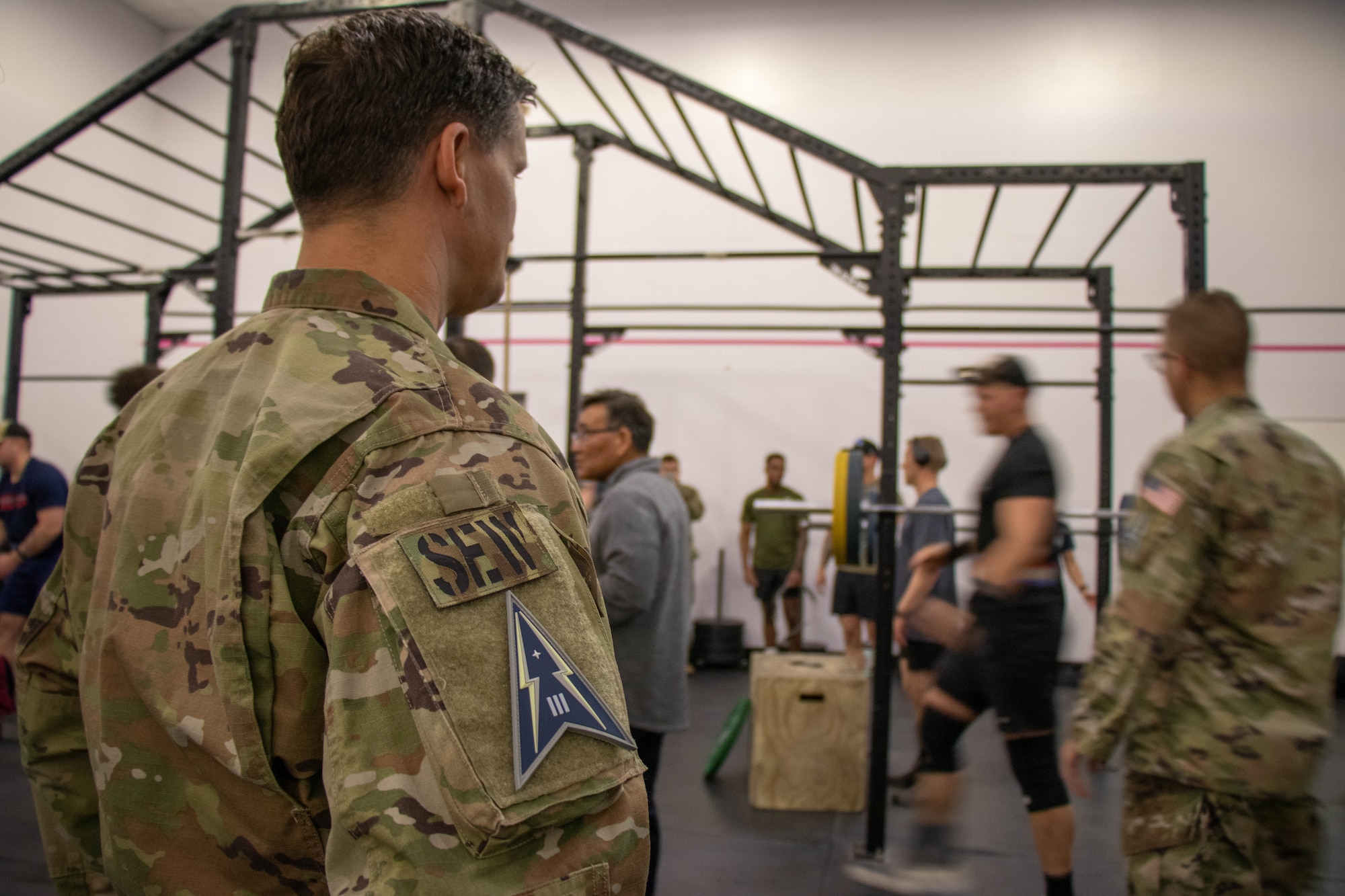 
Between muffled music from a nearby speaker and the sounds of cheers and barbells clinking, Guardians and Airmen from Space Delta 3 – Space Electromagnetic Warfare participated in a DEL 3 Lift Off at the Peterson Space Force gym Feb. 28, 2024.