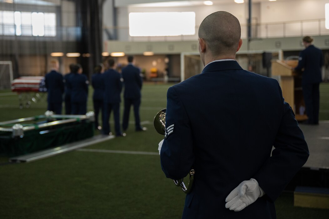 U.S Air Force Senior Airman John Fitzpatrick stands at parade rest before the start of an honor guard graduation at Eielson Air Force Base, Alaska.