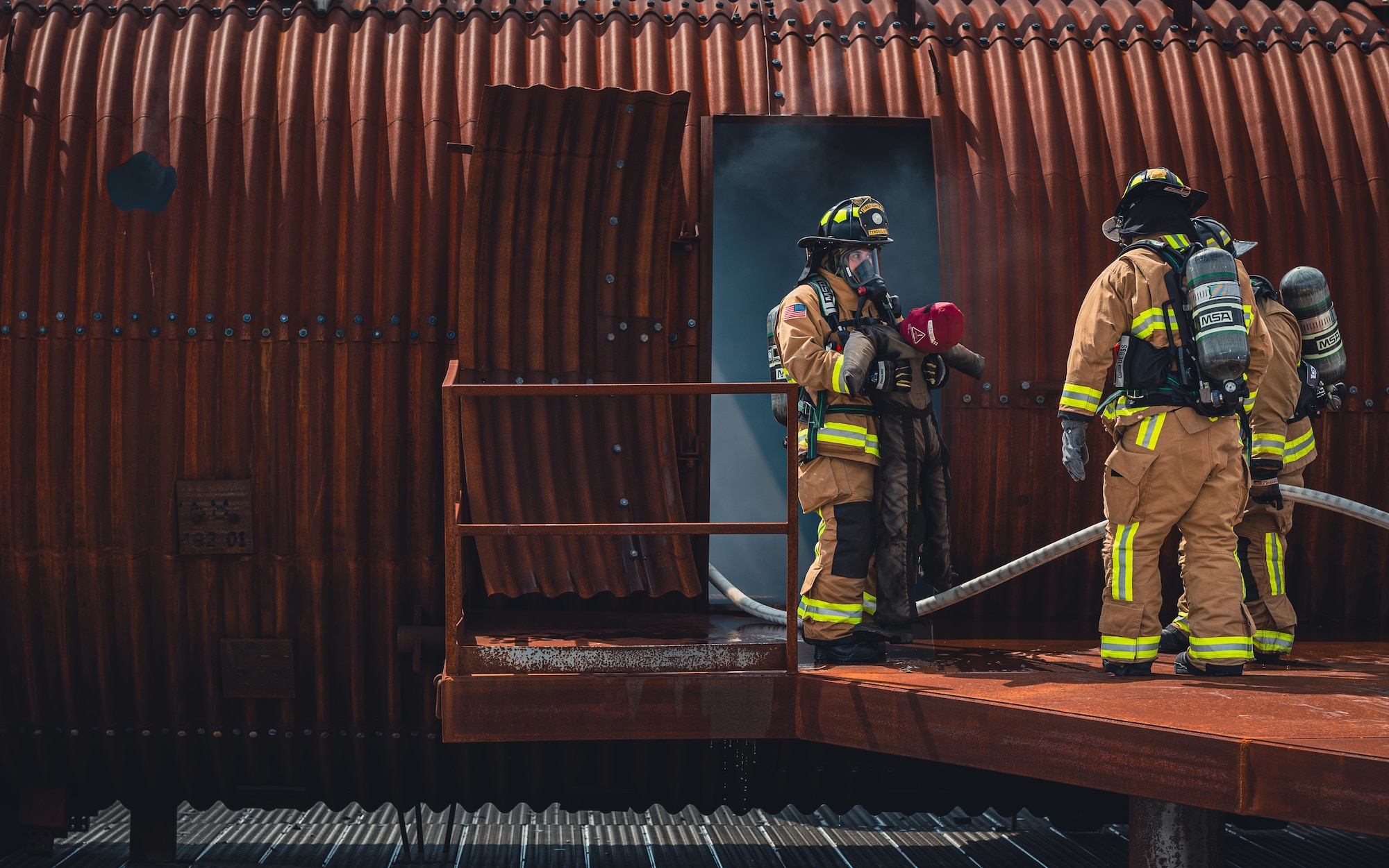 Airmen simulate an emergency situation