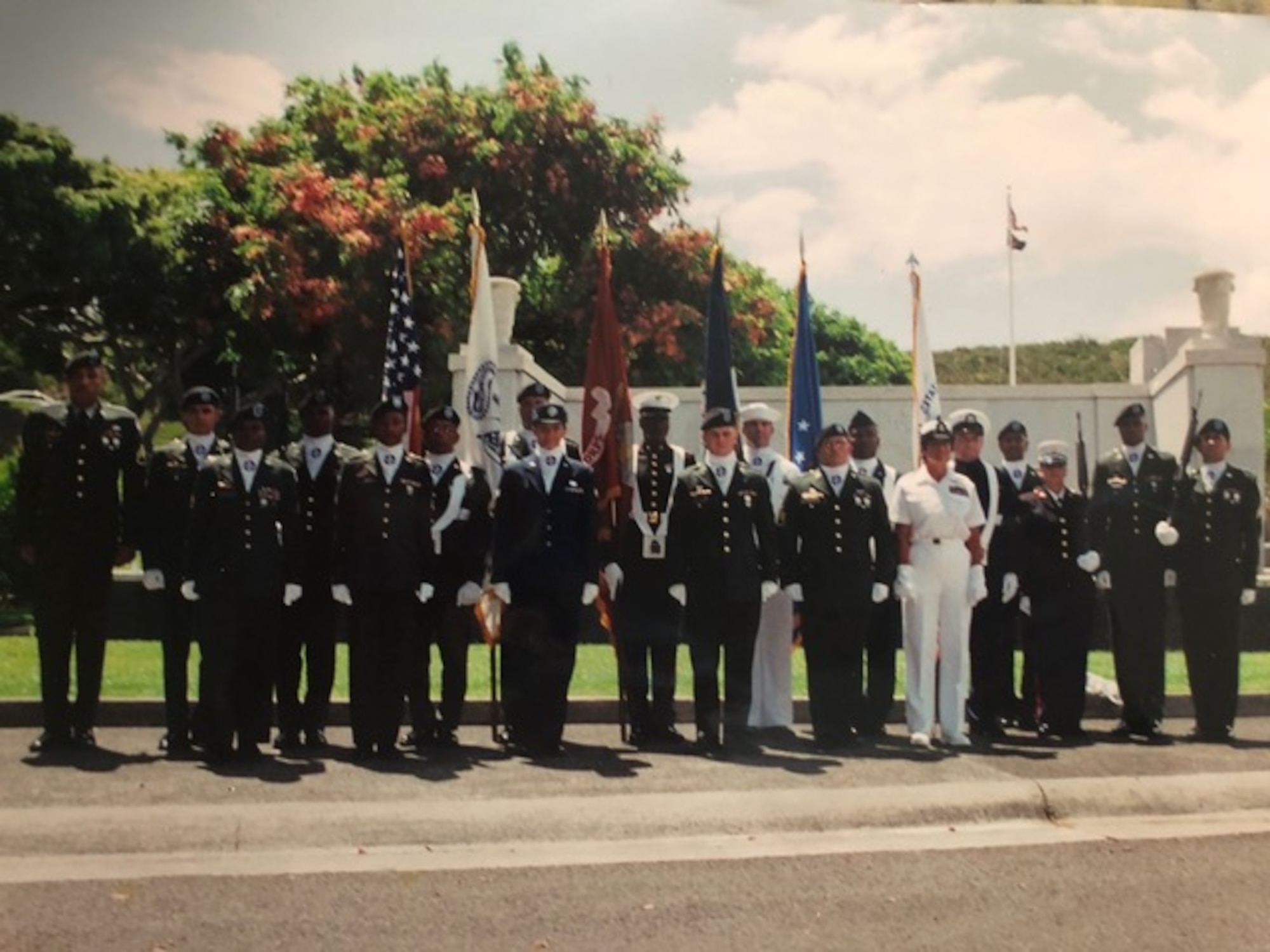 U.S. Air Force retired Tech. Sgt. Daylena Ricks, photojournalist, participates in the Memorial Day Parade Joint Service Honor Guard at the National Memorial Cemetery, Hawaii in 2002.