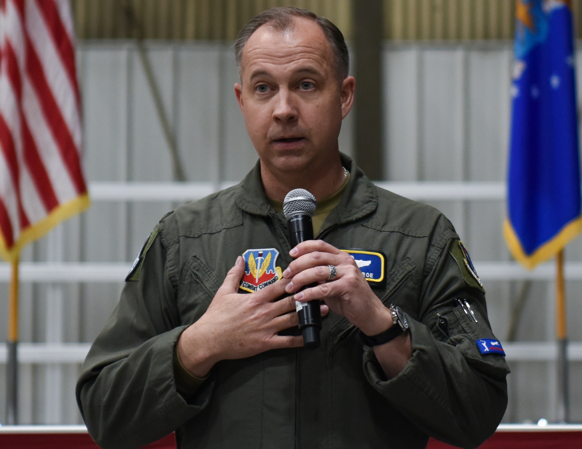 Airmen being addressed at deployment briefing