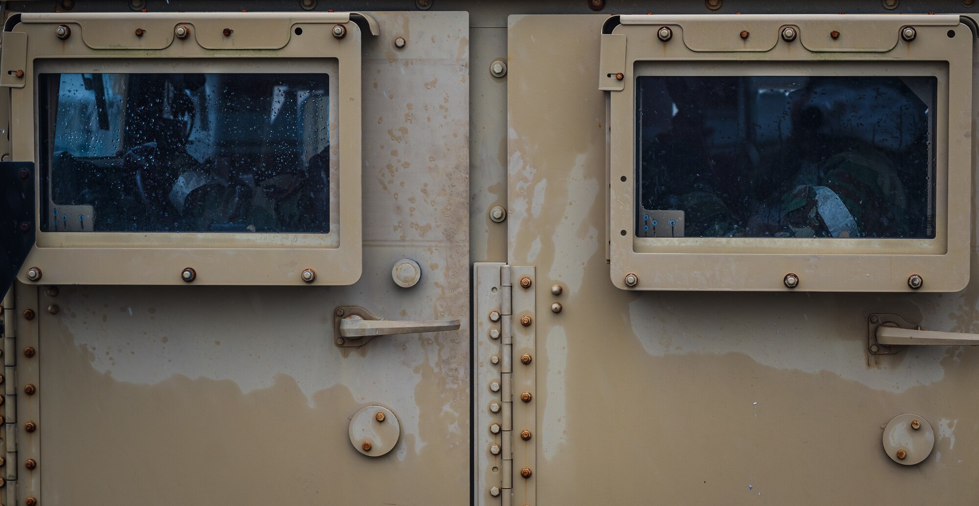 Humvee and Airmen during an exercise