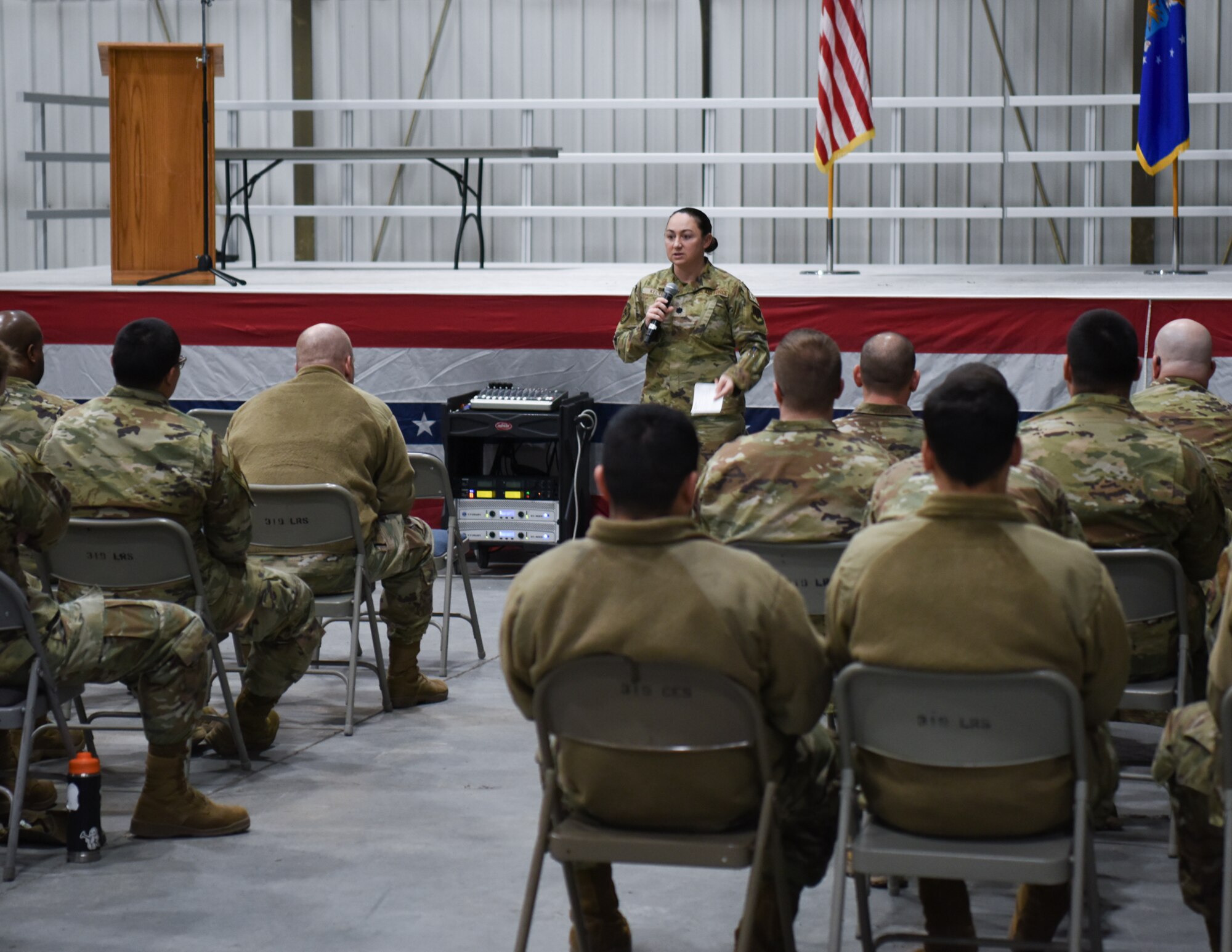 Airmen being addressed at deployment briefing