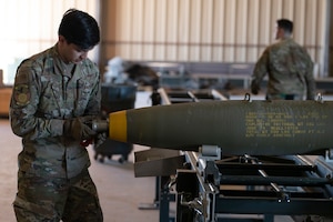 U.S. Air Force Senior Airman Samuel Montoya, 49th Equipment Maintenance Squadron crew chief, constructs a Mark 82 bomb at Holloman Air Force Base, New Mexico, Feb. 21, 2024. Assembling MK-82’s provides realistic training for Airmen in real-time war scenarios to test their readiness capabilities. (U.S. Air Force photo by Airman 1st Class Michelle Ferrari)