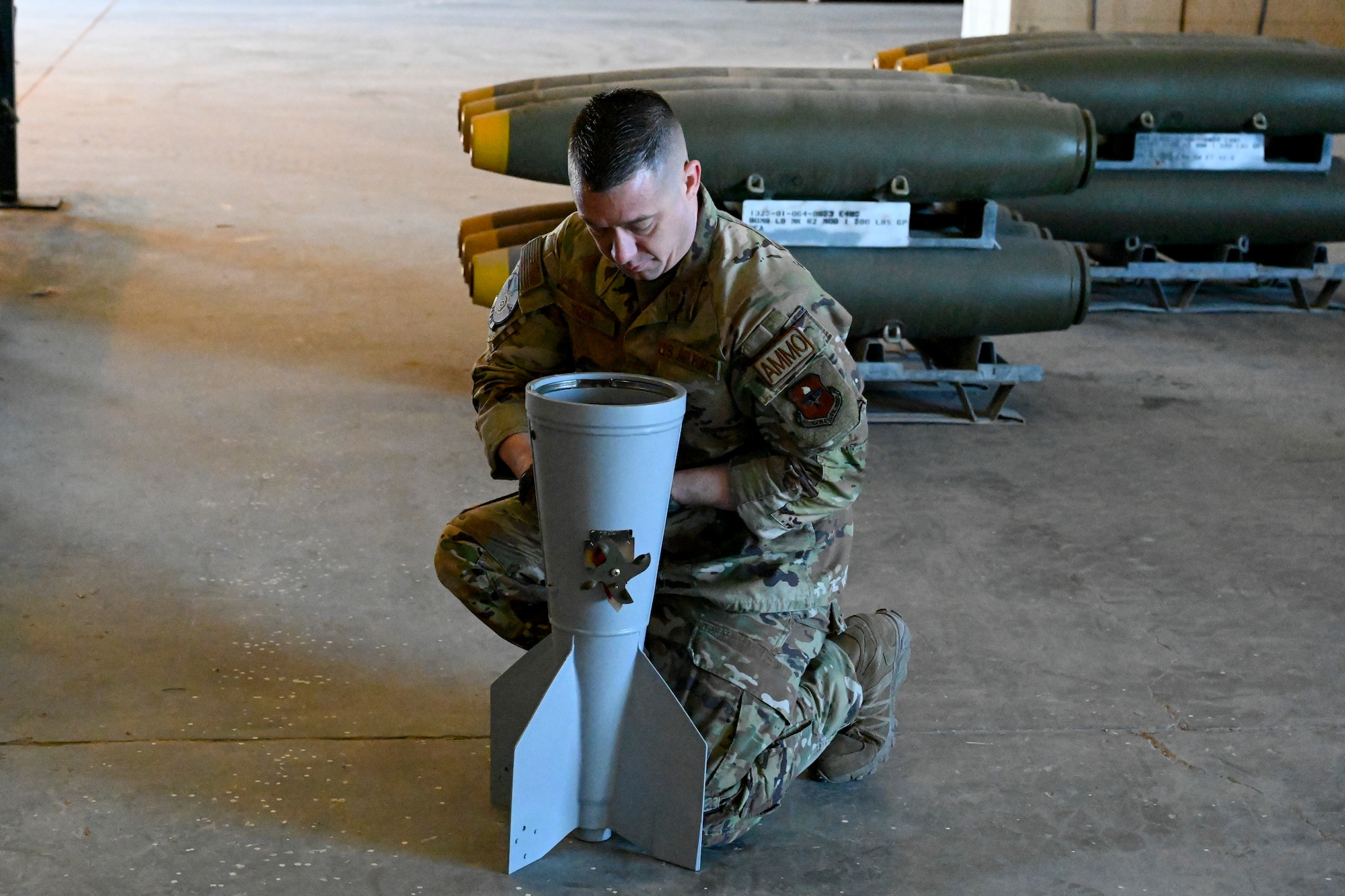 U.S. Air Force Tech. Sgt. Corey York, 49th Equipment Maintenance Squadron production supervisor, prepares a Mark 82 live bomb to be built at Holloman Air Force Base, New Mexico, Feb. 21, 2024. he Mk-82 is a versatile bomb used for various operations that require meticulous assembly, enhancing the training environment to help develop Airmen. (U.S. Air Force photo by Airman 1st Class Michelle Ferrari)