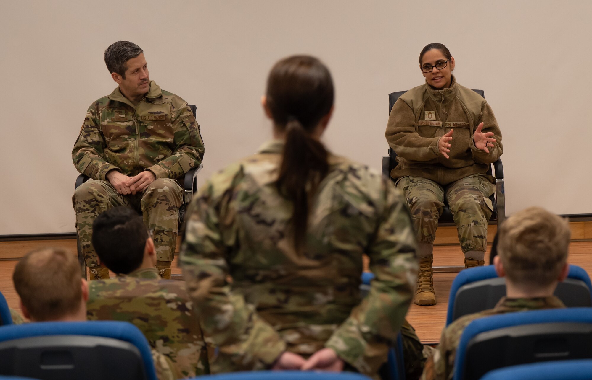 U.S. Air Force Col. William McKibban, 51st Fighter Wing commander, left, and Chief Master Sgt. Lisa Thrasher Stallard, 51st Medical Group senior enlisted leader, right, answer questions from First Term Enlisted Course attendees at Osan Air Base, Republic of Korea, March 6, 2024. FTEC is a professional development course designed to transition first term Airmen to a mission-oriented mindset after their technical training. The 51st FW is committed to equipping Airmen with the resources they need to remain vigilant in their defense of Osan AB and the ROK. (U.S. Air Force photo by Senior Airman Brittany Russell)