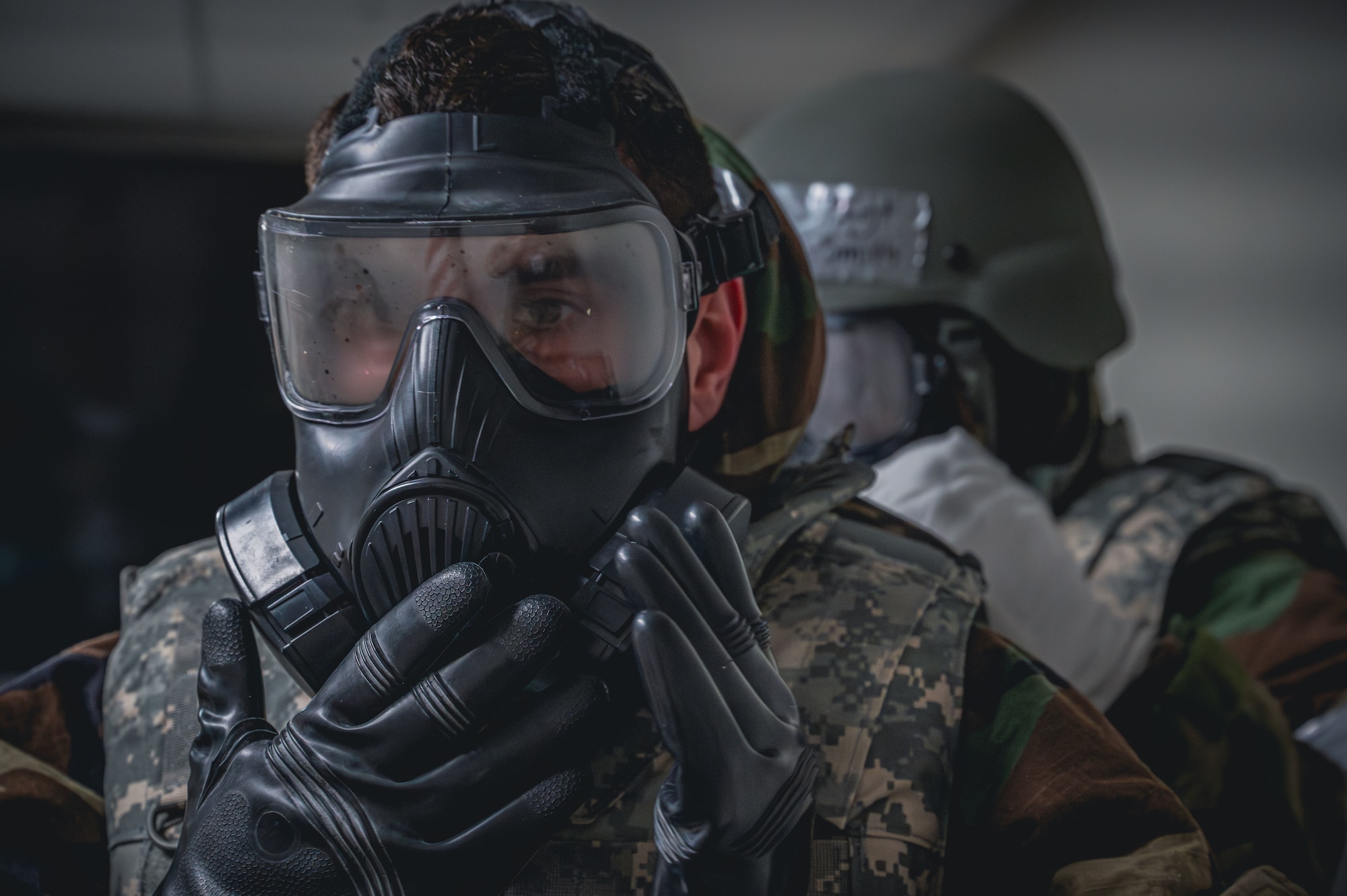 Airmen equip chemical gear