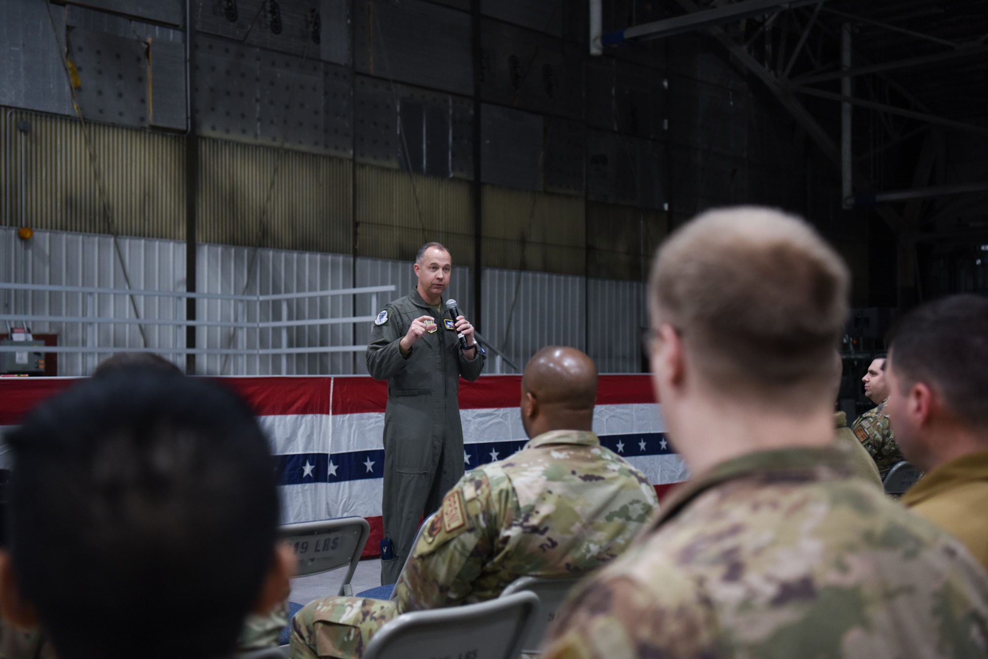 Airmen being addressed at deployment briefing
