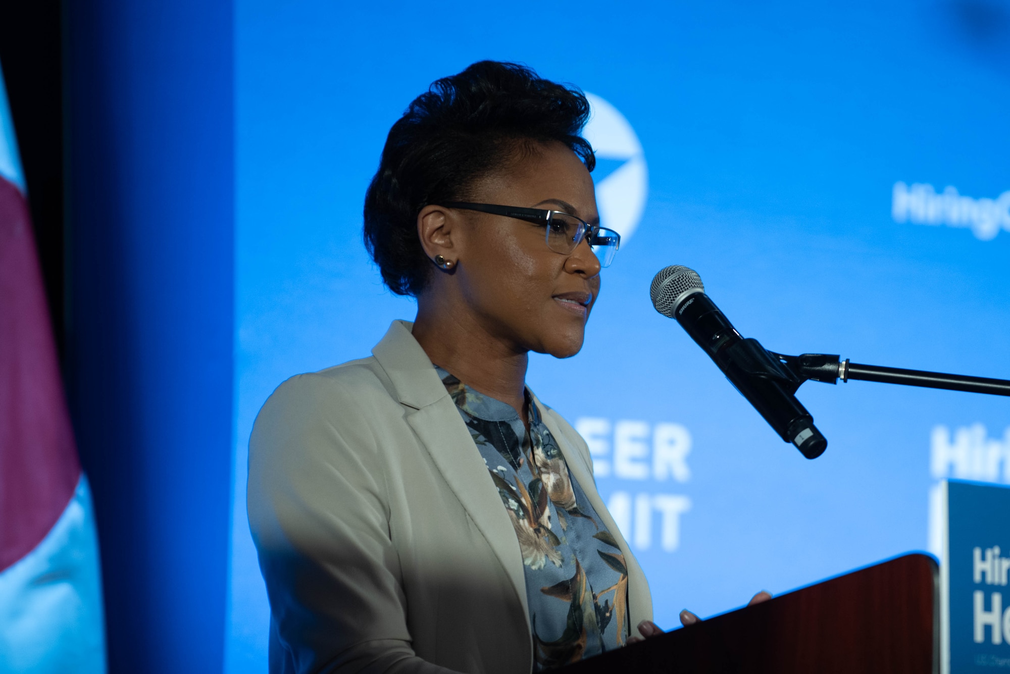 A doctor speaks at an event.