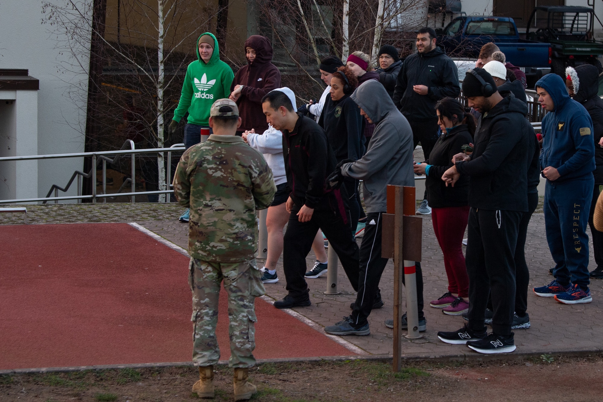 Runners line up at the starting line before a run