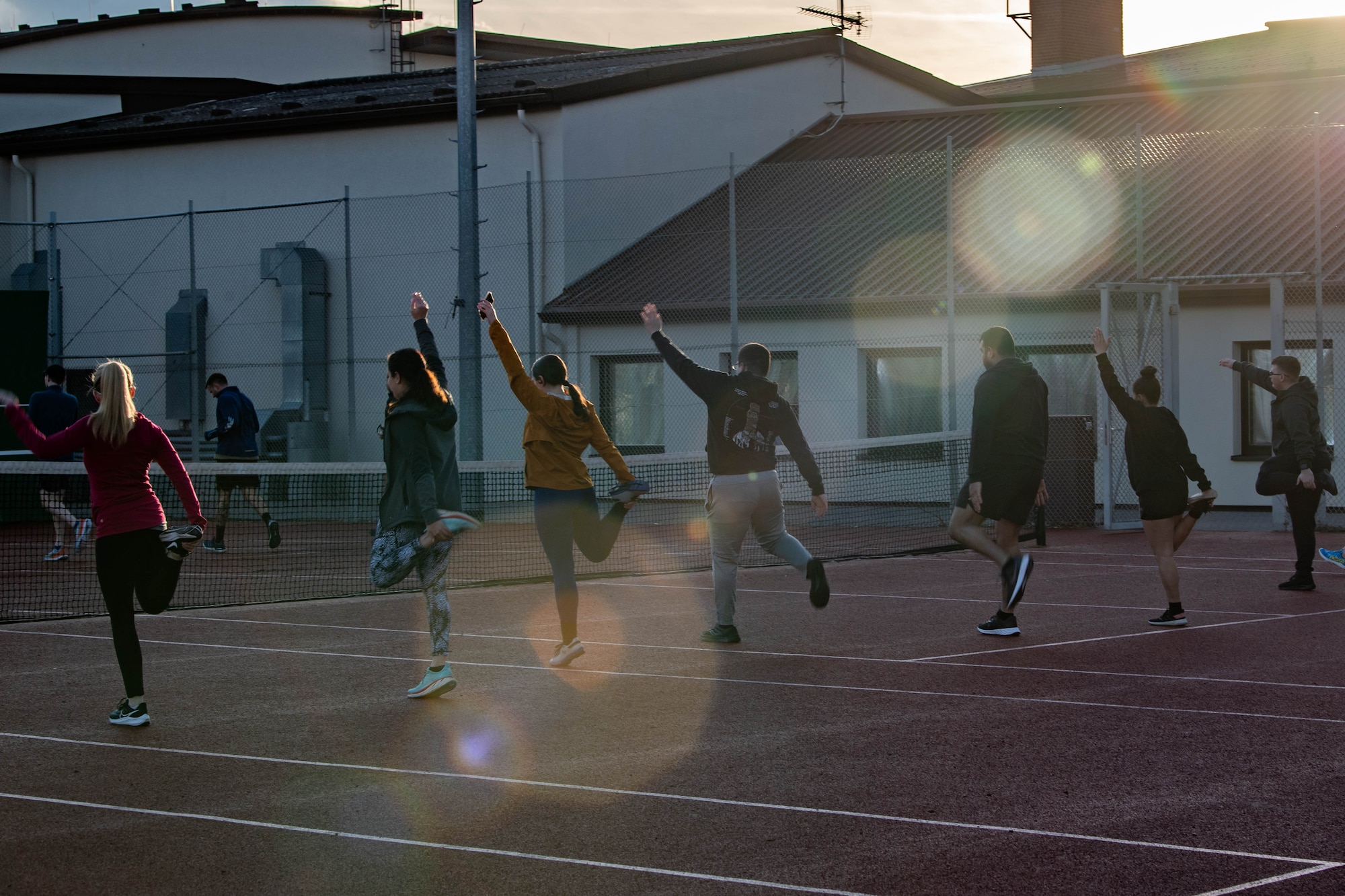 KMC members warm up before a run