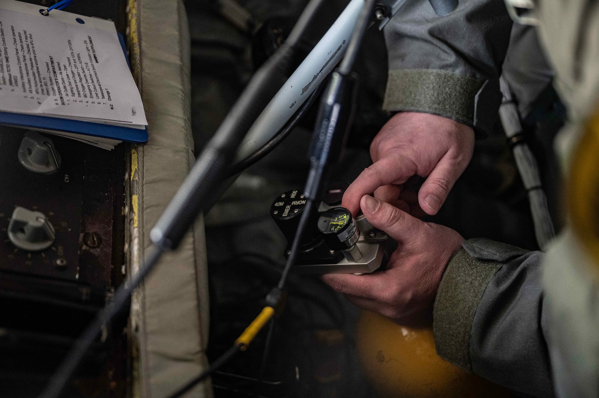 U.S. Air Force Master Sgt. Terrel Frigger, 351st Air Refueling Squadron KC-135 boom operator, ensures oxygen tanks are serviceable during pre-flight checks at Royal Air Force Mildenhall, England, Mar. 7, 2024. Pre-flight checks are an essential part of flying operations, ensuring the safety of both the aircraft and aircrew. (U.S. Air Force photo by Senior Airman Viviam Chiu)