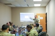 A Maintenance NCO provides detailed instruction on system use during a hands-on exercise at the 207th Maintenance and Logistics Symposium