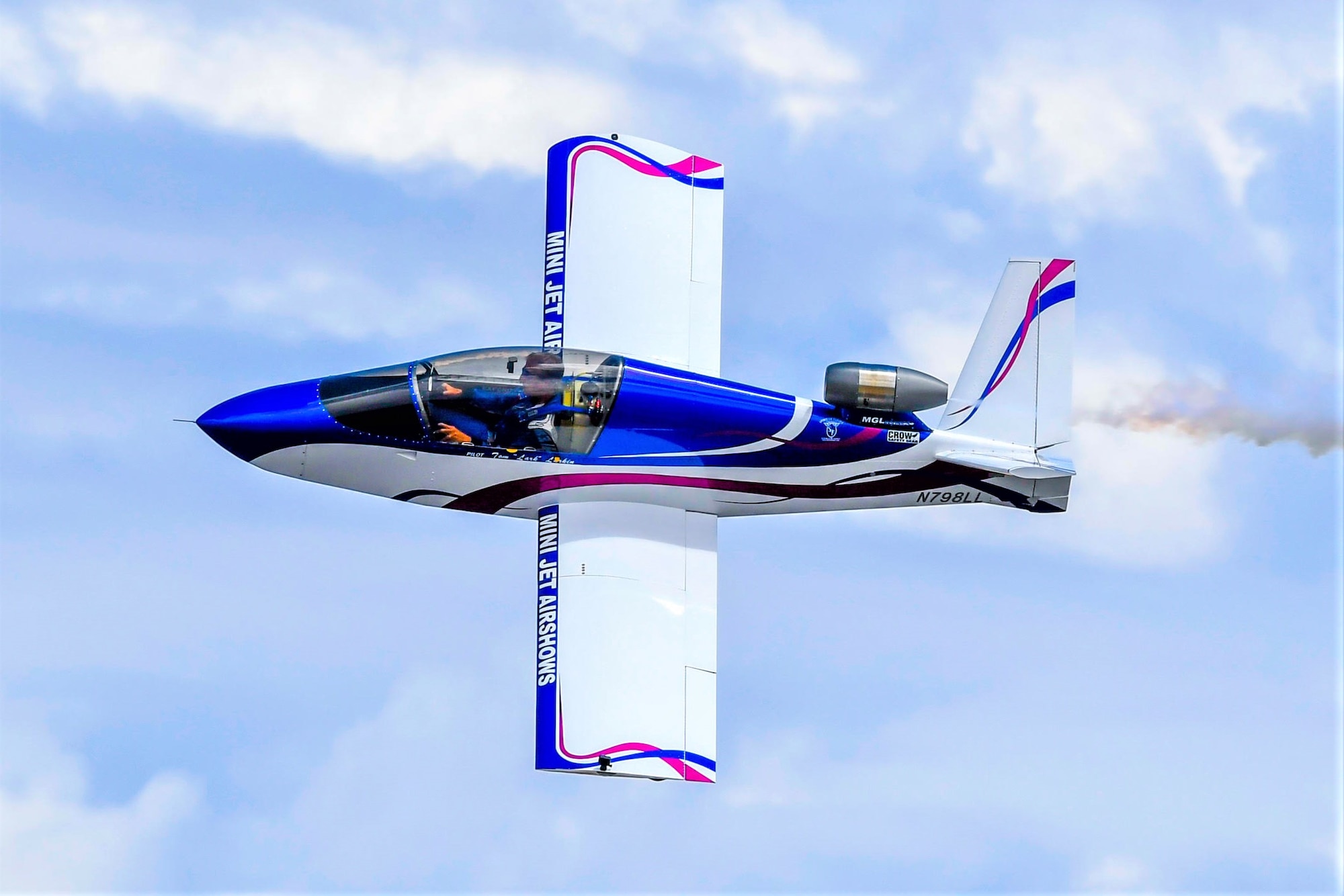 A plane soars through the sky.