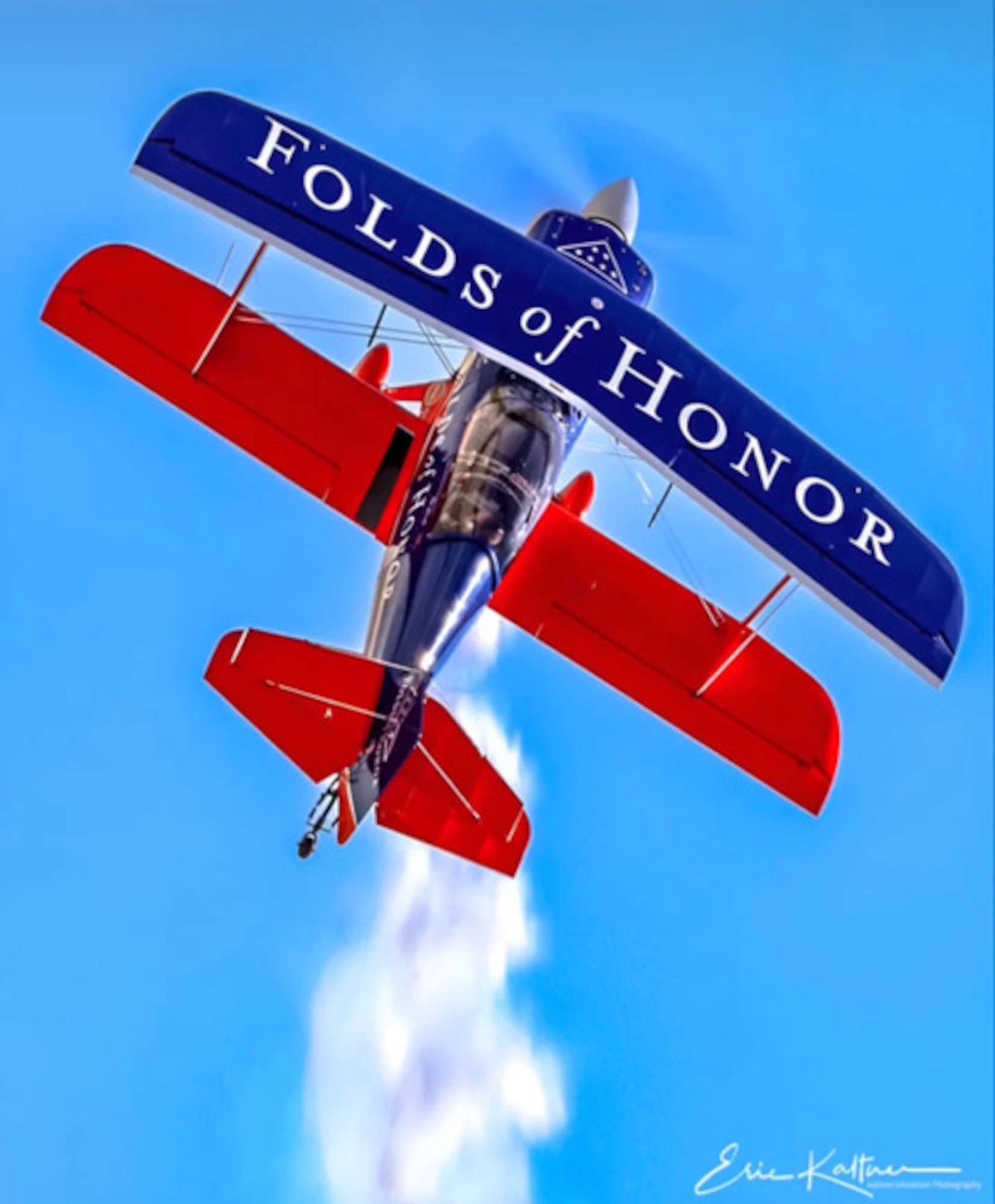 A plane soars through the sky.