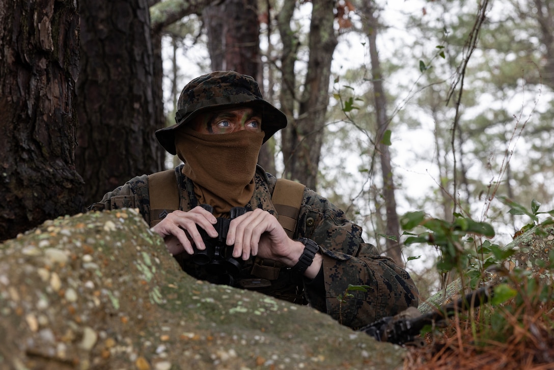 U.S. Marine Corps Cpl. John Gannon, a Pennsylvania native and rifleman with 2d Light Armored Reconnaissance Battalion, 2d Marine Division, conducts reconnaissance as part of a Littoral Exercise I (LEX I), on Camp Lejeune, North Carolina, Mar. 6, 2024. During LEX I, Marines experimented with new tactics and trained in preparation for upcoming deployments. (U.S. Marine Corps photo by Lance Cpl. Oliver Nisbet)