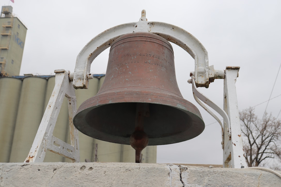 Bell located at opening to Reynolds Park at Ward Avenue on the northern section of the floodwall.