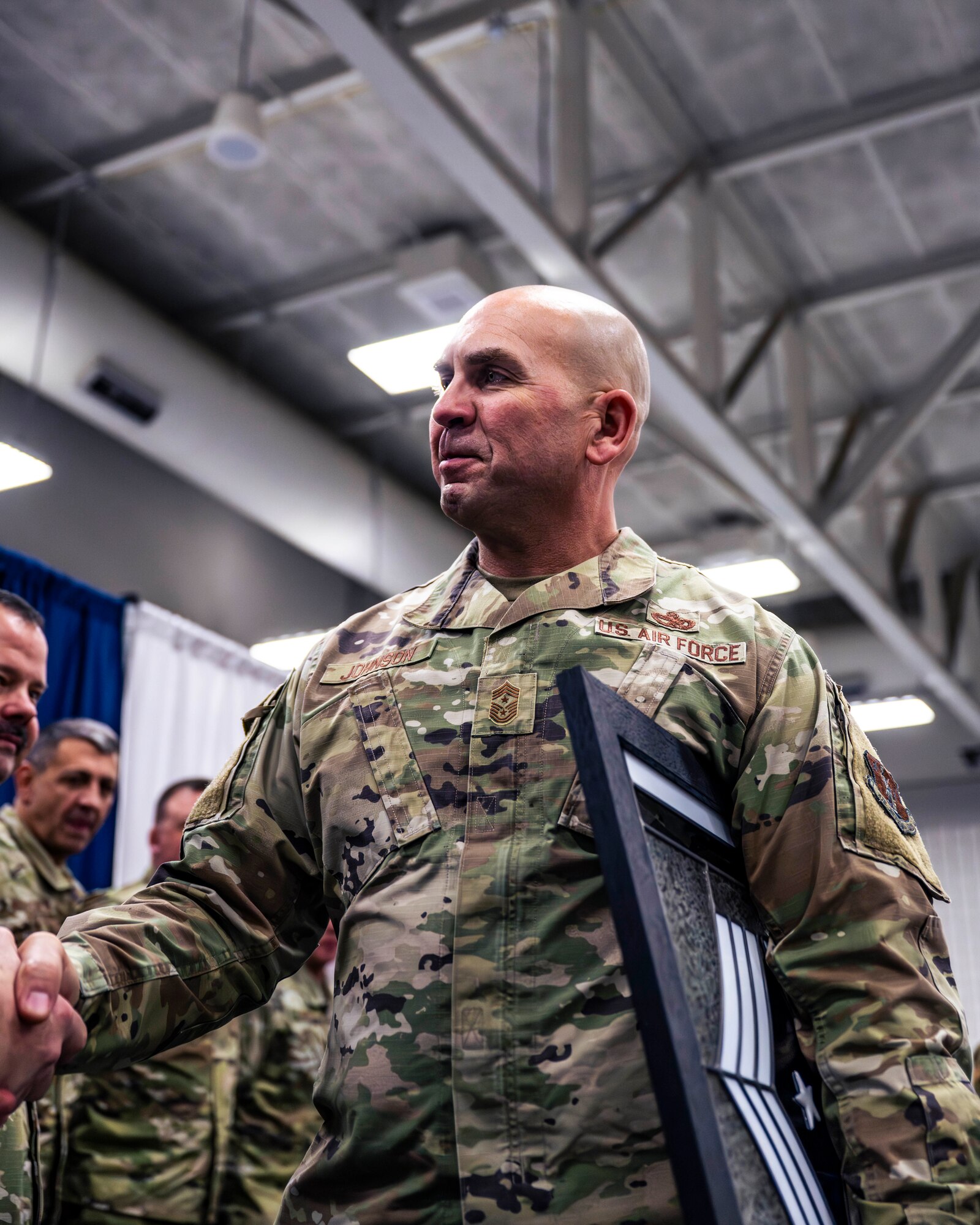 Chief Master Sgt. Michael Johnson relinquishes the position of the 134th Air Refueling Wing Command Chief Master Sergeant, March 2, 2024, at McGhee Tyson Air Base, Knoxville, Tennessee.