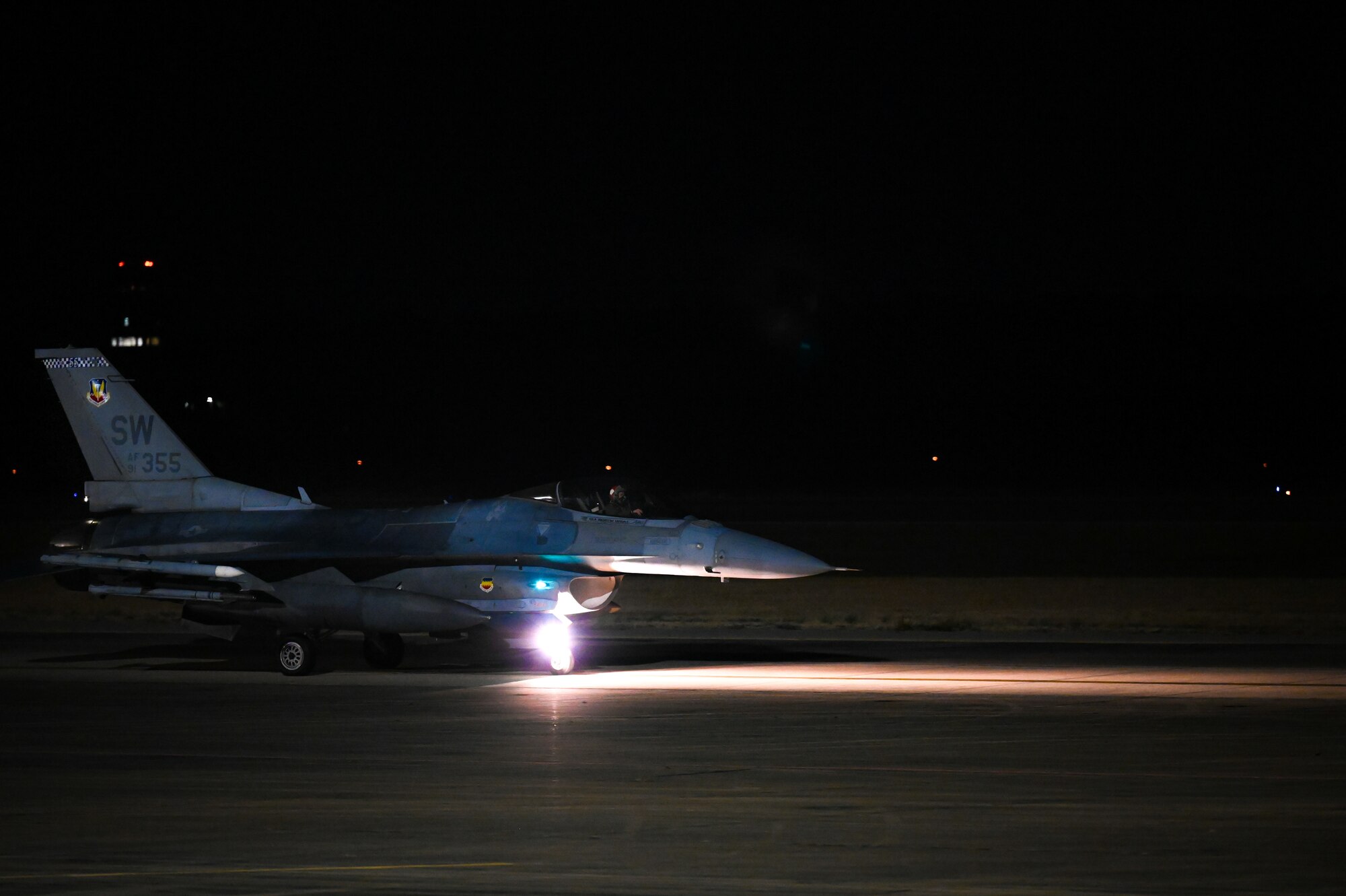 Jet flying off the flightline.