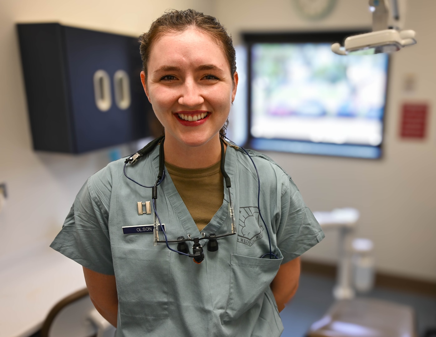 Capt. Anna Olson, a dentist assigned to the 59th Dental Squadron, poses for a photo at Dunn Dental Clinic, Joint Base San Antonio-Lackland, Texas, in honor of National Dentist Day, March 6, 2024.