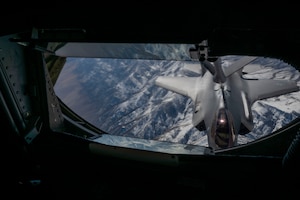 A KC-135 Stratotanker assigned to McConnell Air Force Base, Kanas, refuels an F-35 Lightning II assigned to Hill Air Force Base, Utah, during EXPLODEO Feb. 27, 2024, over the Rocky Mountains. EXPLODEO, a McConnell Air Force Base, Kansas, exercise, tested the 22nd and 931st Air Refueling Wings’ ability to rapidly deploy and employ into a theater. (U.S. Air Force photo by Airman 1st Class Gavin Hameed)