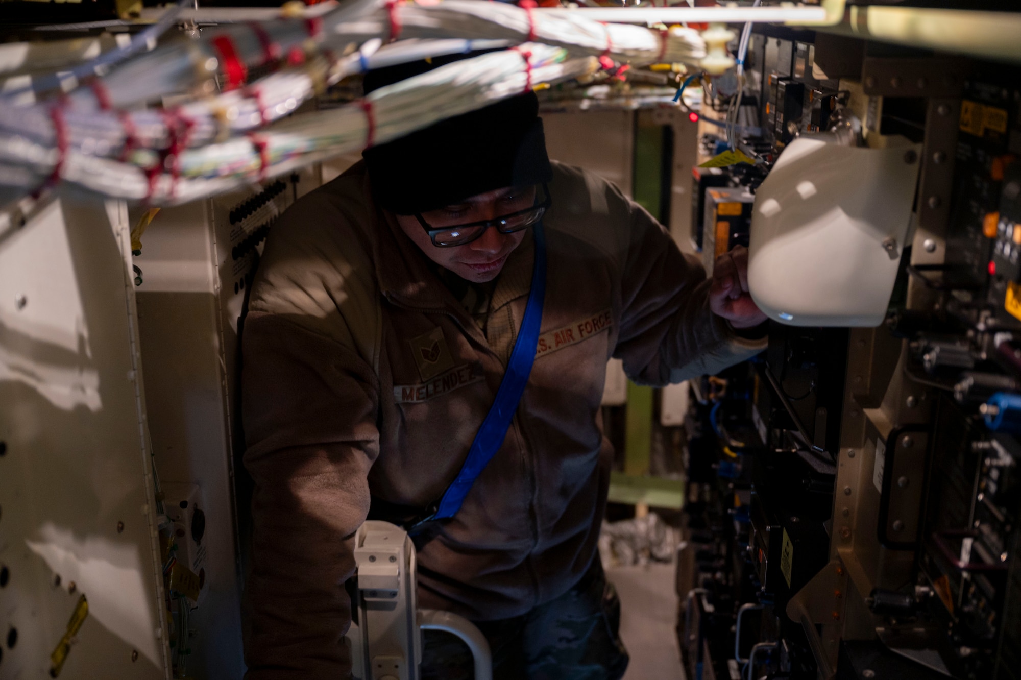 Staff Sgt. Alejandro Melendez, 22nd Aircraft Maintenance Squadron crew chief, inspects the inside of a KC-46 Pegasus during EXPLODEO Feb. 28, 2024, at Joint Base Lewis-McChord. EXPLODEO. a McConnell Air Force Base, Kansas, exercise, tested the 22nd and 931st Air Refueling Wings’ ability to rapidly deploy and employ into a theater. (U.S. Air Force photo by Airman 1st Class Gavin Hameed)