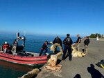Coast Guard Cutter Joseph Napier’s small boat crew offloads 182 kilograms of cocaine to federal law enforcement authorities in Mayaguez, Puerto Rico, March 8, 2024. The British Royal Navy HMS Trent (P224), operating with a Coast Guard LEDET onboard, seized the contraband and apprehended two smugglers, Dominican Republic nationals, following the interdiction of a go-fast vessel in Caribbean Sea waters southwest coast of Cabo Rojo, Puerto Rico, March 3, 2024. (Courtesy photo)
