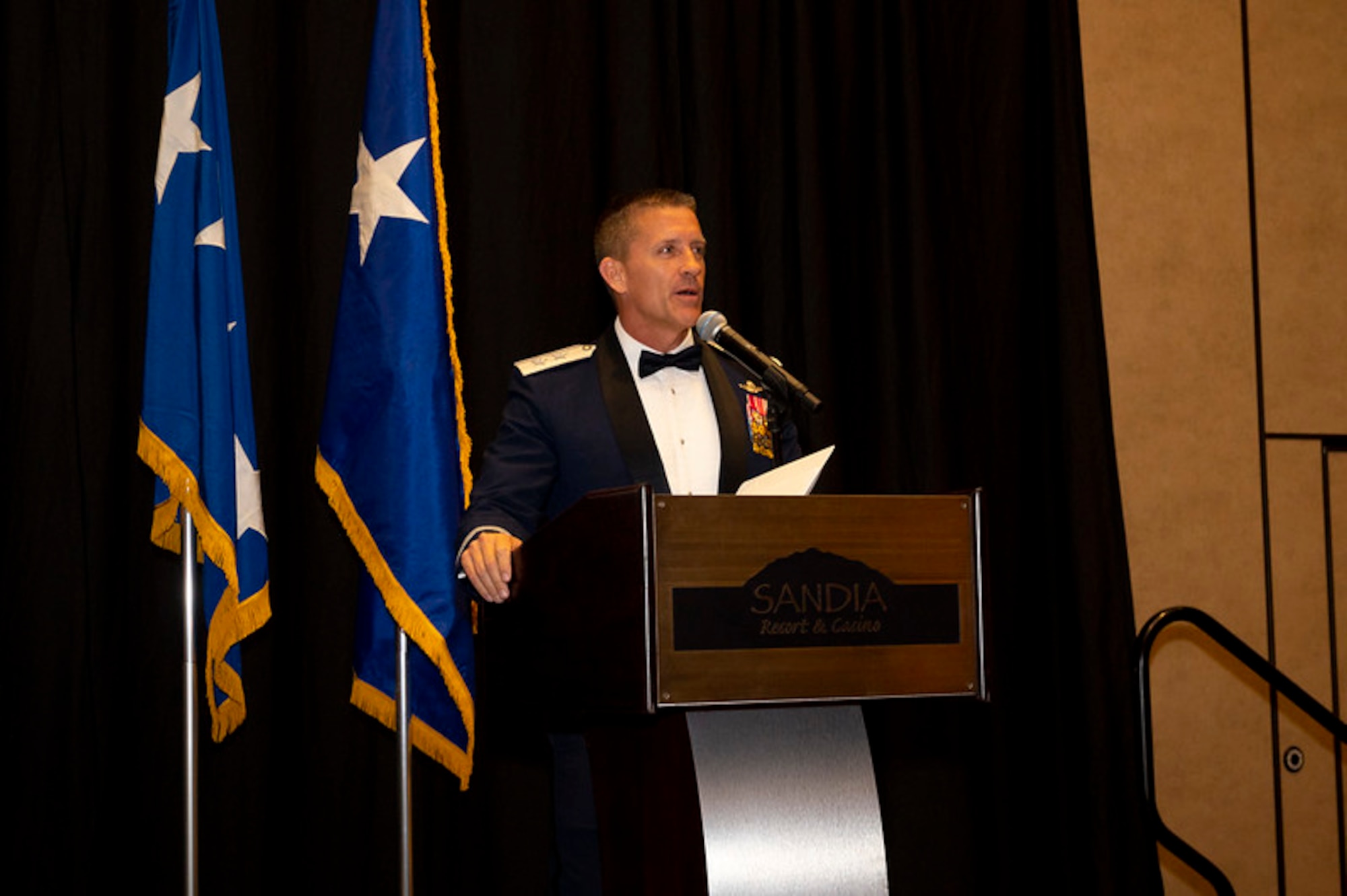 Maj. Gen. Trey Rawls, Air Force Operational Test and Evaluation Center Commander, addresses attendees at the AFOTEC 50th Anniversary Celebration held at the Sandia Resort in Albuquerque, N.M., on March 6, 2024 that brought together current and former AFOTEC members, past AFOTEC commanders, Kirtland AFB leaders, and New Mexico military and community leaders to celebrate 50 years of operational testing excellence.