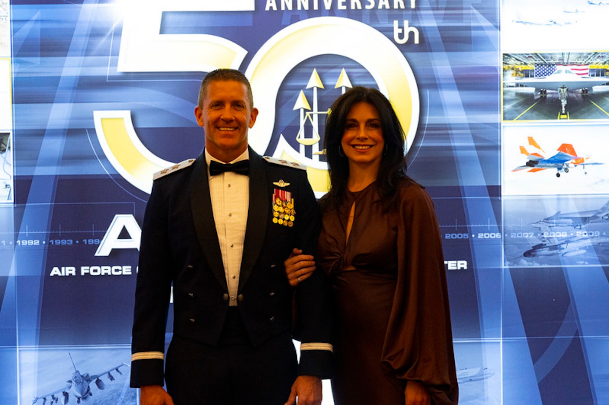 Air Force Operational Test and Evaluation Center Commander Maj. Gen. Trey Rawls, and his wife Scotta attend the AFOTEC 50th Anniversary Celebration held at the Sandia Resort in Albuquerque, N.M., on March 6, 2024.