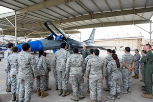 U.S. Air Force Capt. Daniel Frieson, 309th Fighter Squadron instructor pilot, gives a tour of an F-16C Fighting Falcon cockpit to a Westwood High School Air Force Junior Reserve Officer Training Corps student, Mar. 7, 2024, at Luke Air Force Base, Arizona.