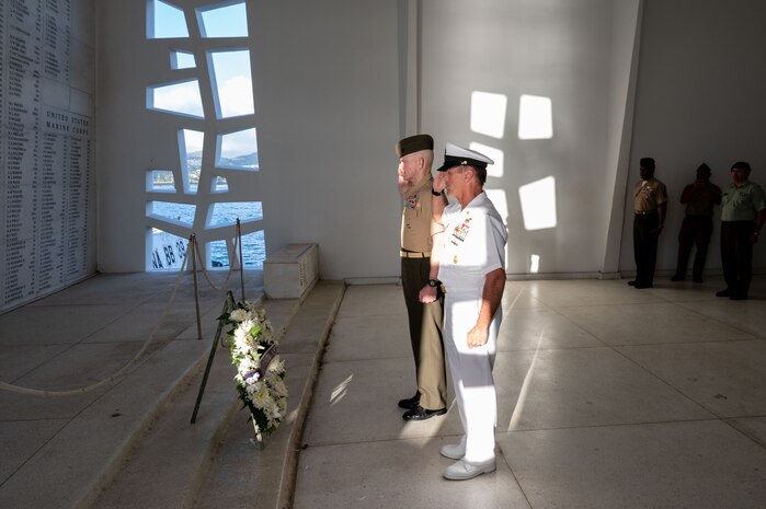 Senior Enlisted Advisor to the Chairman (SEAC) U.S. Marine Corps Sgt. Maj. Troy E. Black, left, Fleet Master Chief David Isom, Command senior enlisted leader for U.S. Indo-Pacific Command, right, render their respects at the USS Arizona Memorial in Pearl Harbor, Hawaii, Mar. 4, 2024. The SEAC convened the Winter 2024 DSELC in Hawaii for top U.S. Armed Forces Enlisted leaders to engage in significant issues like Enlisted Joint Professional Military Education, the Joint Command Senior Enlisted Nominative process, as well as the warfighting and support capabilities of members’ commands in the Joint Force environment. (U.S. Army photo by Sgt. Austin Riel)