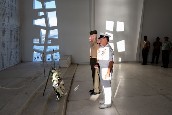 Senior Enlisted Advisor to the Chairman (SEAC) U.S. Marine Corps Sgt. Maj. Troy E. Black, left, Fleet Master Chief David Isom, Command senior enlisted leader for U.S. Indo-Pacific Command, right, render their respects at the USS Arizona Memorial in Pearl Harbor, Hawaii, Mar. 4, 2024. The SEAC convened the Winter 2024 DSELC in Hawaii for top U.S. Armed Forces Enlisted leaders to engage in significant issues like Enlisted Joint Professional Military Education, the Joint Command Senior Enlisted Nominative process, as well as the warfighting and support capabilities of members’ commands in the Joint Force environment. (U.S. Army photo by Sgt. Austin Riel)