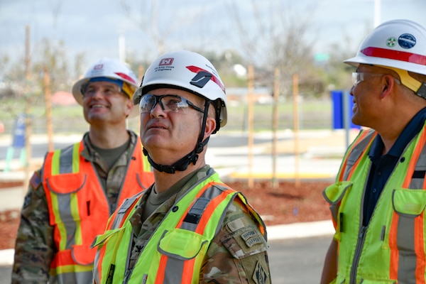 Col. James Handura, commander of the U.S. Army Corps of Engineers South Pacific Division, looks up at the front of the VA Community Based Outpatient Clinic in Stockton, California.