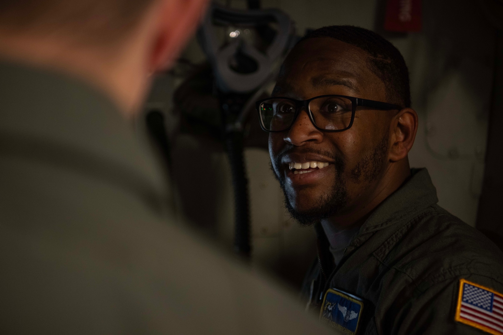 An Airman smiles.