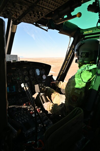 Pilot flies UH-1N helicopter