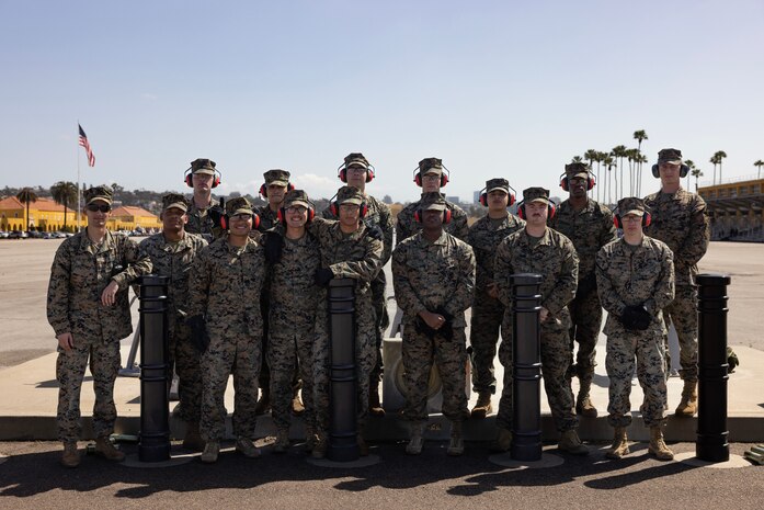 U.S. Marines with the Marine Corps Recruit Depot San Diego Funeral and Cannon Detail, pose for a photo after rendering honors to Lt. Gen. Brian Cavanaugh, Commanding General, Fleet Marine Force, Atlantic; Commander, Marine Forces Command; and Commander, Marine Forces Northern Command at MCRD San Diego, California, Mar. 8, 2024. Cavanaugh visited the depot to participate in the graduation ceremony of Delta Company as the parade reviewing officer and was honored with a fifteen-gun salute. (U.S. Marine Corps photo by Cpl. Alexander O. Devereux)