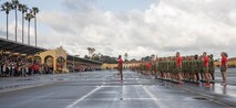 U.S. Marines with Delta Company, 1st Recruit Training Battalion, Recruit Training Regiment, wait to execute warm-up exercises before a motivational run at Marine Corps Recruit Depot San Diego, California, Mar. 7, 2024. The motivational run is the last physical training event the Marines will conduct before they graduate from MCRD San Diego and is the first time the friends and families will see their new Marines and is the first time the friends and families will see their new Marines. (U.S. Marine Corps photo by Lance Cpl. Janell B. Alvarez)