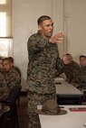 U.S. Marine Corps Sgt. Maj. Joseph Mendez with 2nd Marine Expeditionary Brigade, II Marine Expeditionary Force, leads a discussion during an ethics seminar course at Marine Corps Recruit Depot San Diego, California, Mar. 6, 2024. The ethics seminar is designed to provide train-the-trainer certifications on ethics from the Lejeune Learning Institution and Marine Corps University into entry level training to active-duty service members of MCRDSD.  photo by Lance Cpl. Janell B. Alvarez)