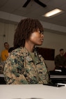 U.S. Marine Corps Gunnery Sgt. Fredrika Marin, an equal opportunity advisor with Marine Air Control Group 38, 3rd Marine Aircraft Wing and I Marine Expeditionary Force, attends an ethics seminar course at Marine Corps Recruit Depot San Diego, California, Mar. 6, 2024. The ethics seminar is designed to provide train-the-trainer certifications on ethics from the Lejeune Learning Institution and Marine Corps University into entry level training to active-duty service members of MCRDSD. (U.S. Marine Corps photo by Lance Cpl. Janell B. Alvarez)