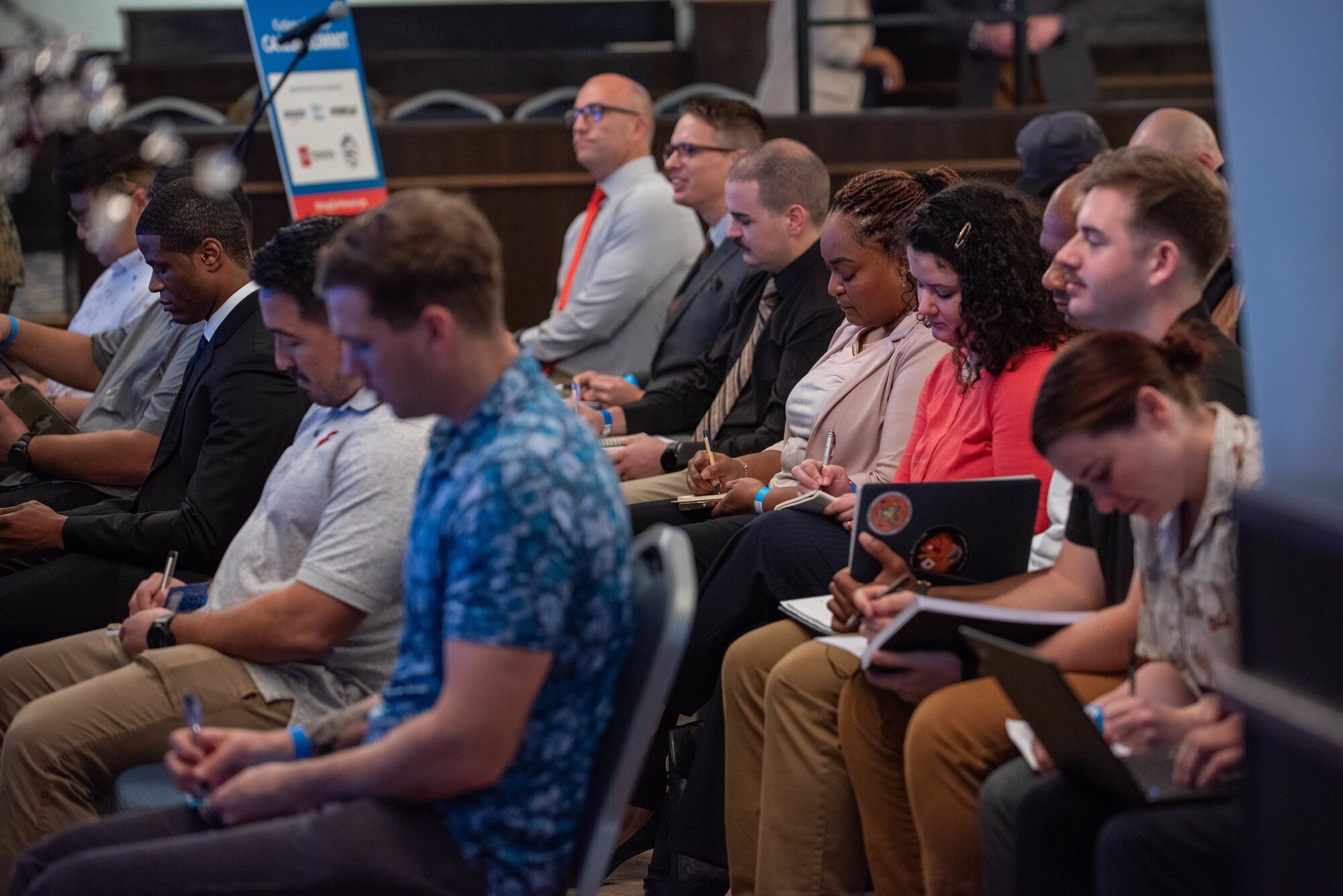 A group sits at an event.
