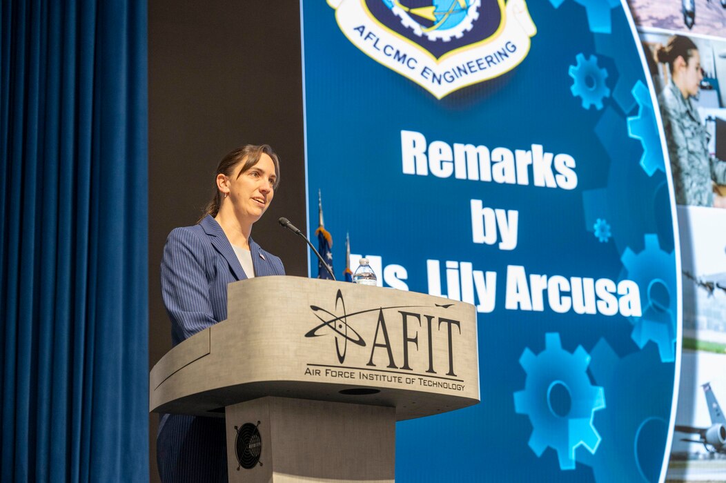Lily Arcusa, engineering directorate director and technical management chief engineer, provides remarks during the directorate's annual awards ceremony on Feb. 21, 2024 at Air Force Institute of Technology's Kenny Hall on Wright-Patterson Air Force Base, Ohio. The ceremony celebrated excellence among team members, with 19 awards presented to both military and civilian Airmen. (U.S. Air Force photo by Staff Sgt. Mikaley Kline)