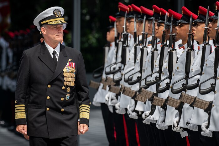 Adm. John C. Aquilino, Commander of U.S. Indo-Pacific Command, conducts a pass in review at an honors ceremony with Singapore Armed Forces at the Ministry of Defence headquarters in Singapore on March 7, 2024. For more than 55 years, the U.S. and Singapore have forged an expansive and enduring relationship based on mutual economic interests, robust security and defense cooperation, and enduring people-to-people ties, making Singapore one of the strongest bilateral partners to the U.S. in Southeast Asia. USINDOPACOM is committed to enhancing stability in the Indo-Pacific region by promoting security cooperation, encouraging peaceful development, responding to contingencies, deterring aggression and, when necessary, fighting to win. (U.S. Navy photo by Chief Mass Communication Specialist Shannon M. Smith)