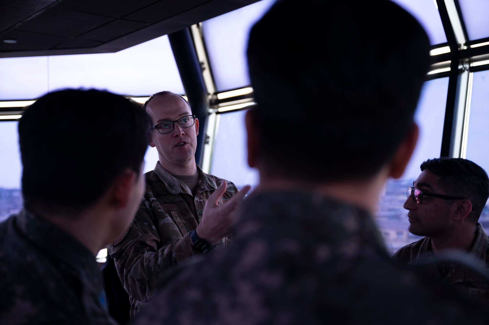 USAF and ROKAF Airmen in air traffic control tower.