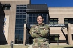 U.S. Air National Guard Staff Sgt. Brooke Parks, 175th Force Support Squadron recruiter, poses for a photo in front of the 175th Wing Headquarters building at Martin State Air National Guard Base, Maryland, Feb. 4, 2024.
