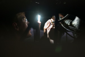 U.S. Air Force Staff Sgt. Robert Car, a 1st Special Operations Logistics Readiness Squadron heavy equipment mechanic, grabs a wrench.